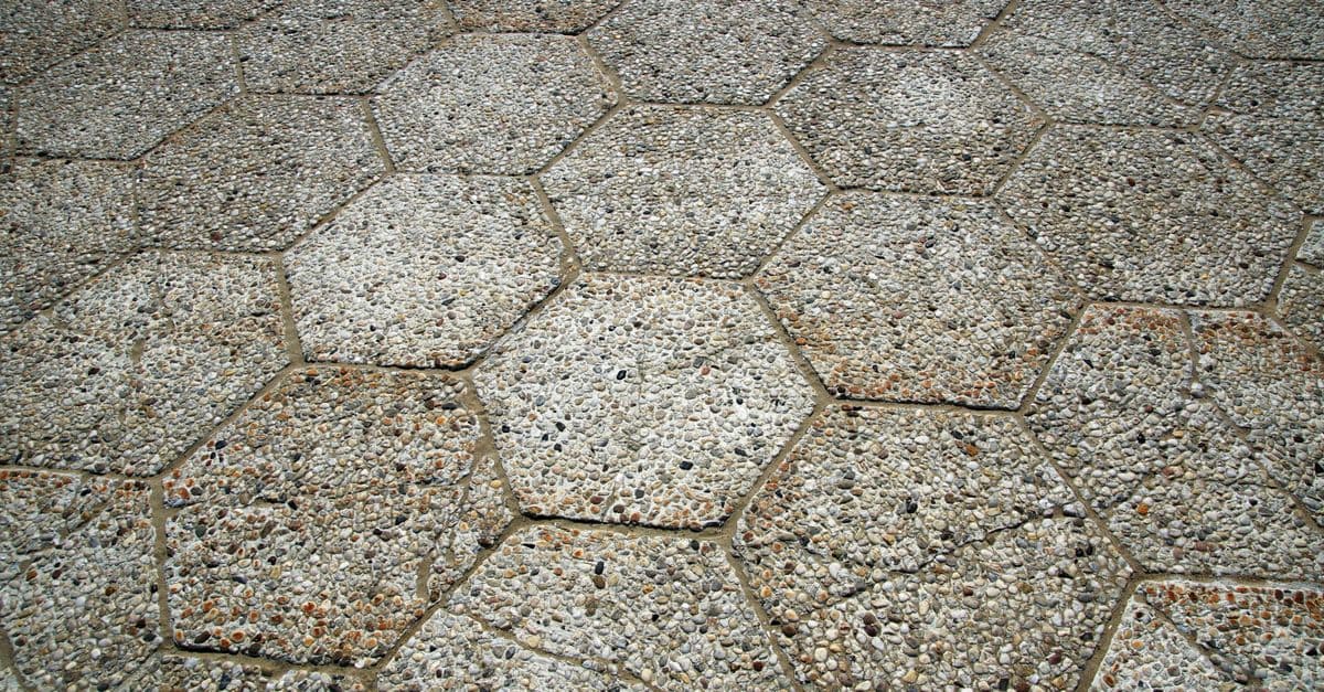 Hardscaping professional at work using GreenRoute field service software