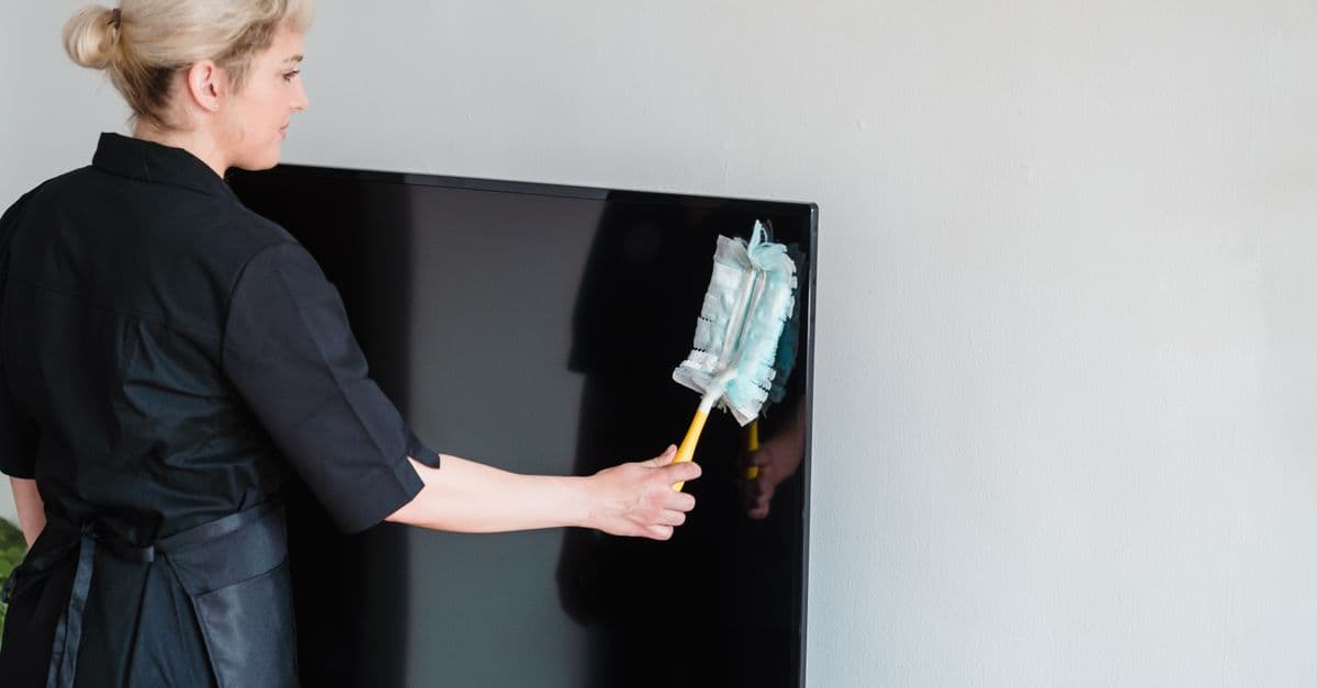 House Cleaning professional at work using GreenRoute field service software