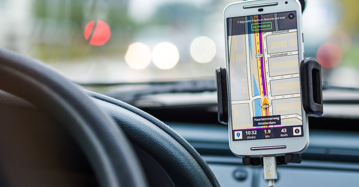 Smartphone GPS navigation mounted in car for optimizing lawn care routes