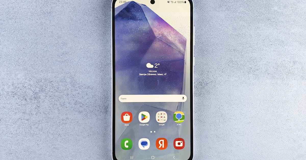 Weather forecast app on a phone for planning lawn care schedules